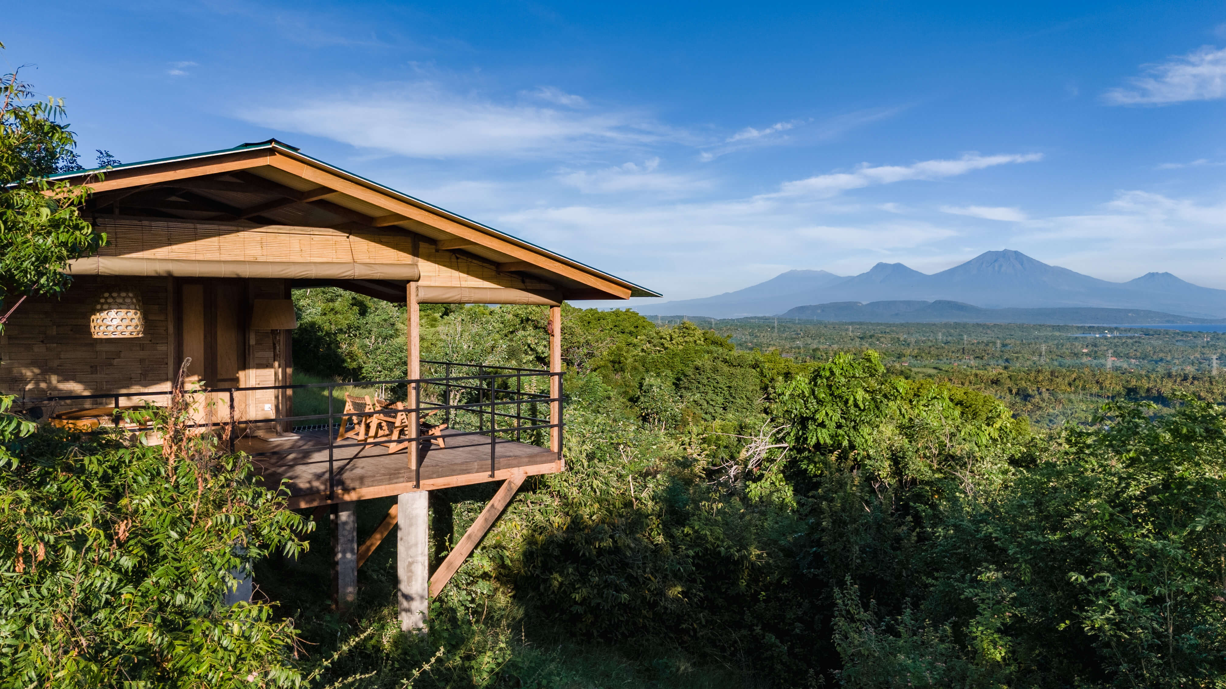 Comfort Cabin 8 at Whana Camp with mountain and sea views